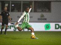 Richard Kone #24 of Wycombe Wanderers F.C. scores from the penalty spot, making the score 1-0, during the Sky Bet League 1 match between Sto...