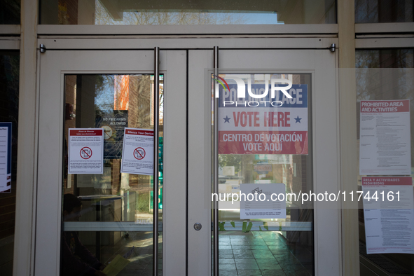 People cast their ballots for President, Congress, and local races for the 2024 election at the Museum of Contemporary Art in Arlington, VA,...