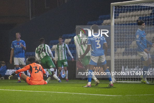 Richard Kone #24 of Wycombe Wanderers F.C. scores a goal, making the score 3-0, during the Sky Bet League 1 match between Stockport County a...