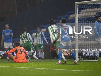 Richard Kone #24 of Wycombe Wanderers F.C. scores a goal, making the score 3-0, during the Sky Bet League 1 match between Stockport County a...