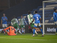 Richard Kone #24 of Wycombe Wanderers F.C. scores a goal, making the score 3-0, during the Sky Bet League 1 match between Stockport County a...