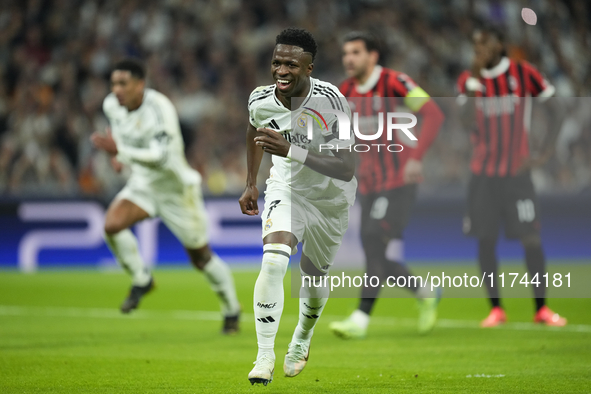 Vinicius Junior left winger of Real Madrid and Brazil celebrates after scoring his sides first goal during the UEFA Champions League 2024/25...