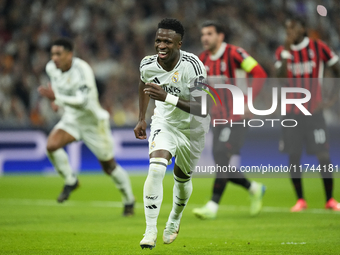 Vinicius Junior left winger of Real Madrid and Brazil celebrates after scoring his sides first goal during the UEFA Champions League 2024/25...