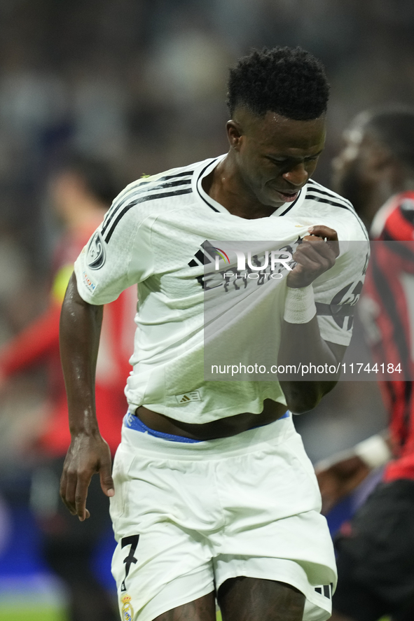 Vinicius Junior left winger of Real Madrid and Brazil celebrates after scoring his sides first goal during the UEFA Champions League 2024/25...