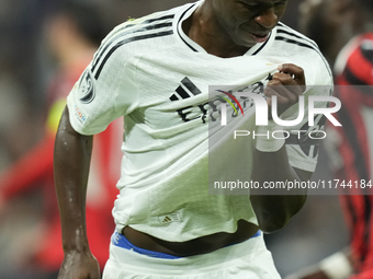 Vinicius Junior left winger of Real Madrid and Brazil celebrates after scoring his sides first goal during the UEFA Champions League 2024/25...