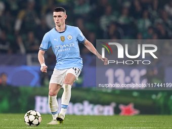 Phil Foden of Manchester City is in action during the UEFA Champions League match between Sporting CP and Manchester City at Jose Alvalade S...