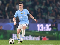 Phil Foden of Manchester City is in action during the UEFA Champions League match between Sporting CP and Manchester City at Jose Alvalade S...