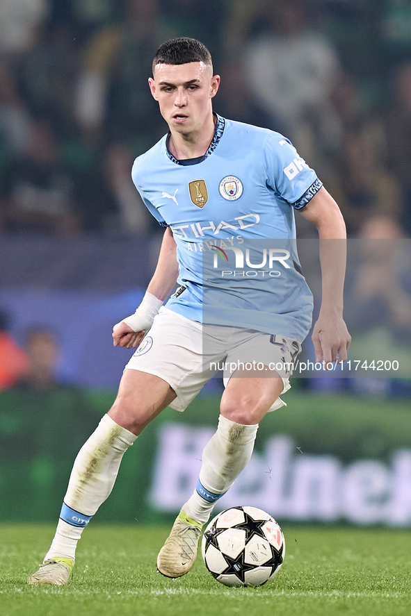 Phil Foden of Manchester City is in action during the UEFA Champions League match between Sporting CP and Manchester City at Jose Alvalade S...