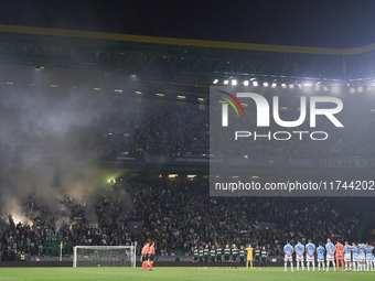 Players, match officials, and fans participate in a minute's silence for the victims of the flooding disaster in Spain before the UEFA Champ...