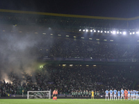 Players, match officials, and fans participate in a minute's silence for the victims of the flooding disaster in Spain before the UEFA Champ...