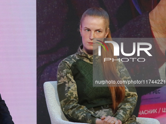 Oksana Rubaniak, the commander of the platoon of unmanned aerial systems of the Ukrainian Armed Forces, attends the Eighth Ukrainian Women's...