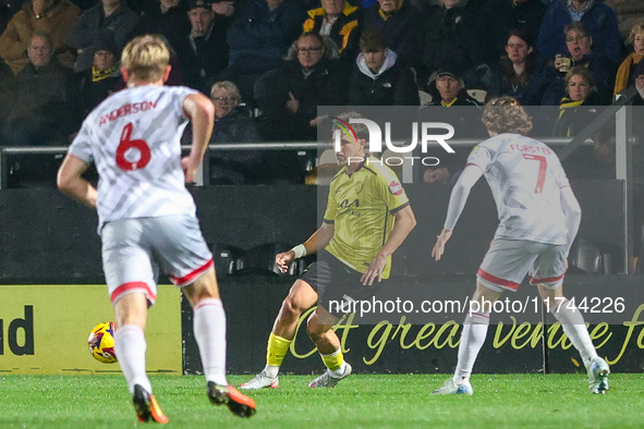 Tomas Kalinauskas of Burton Albion is in action during the Sky Bet League 1 match between Burton Albion and Crawley Town at the Pirelli Stad...