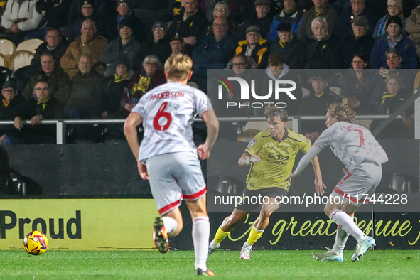 Tomas Kalinauskas of Burton Albion is in action during the Sky Bet League 1 match between Burton Albion and Crawley Town at the Pirelli Stad...