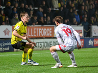 #21, Alex Bannon of Burton Albion and #19, Jeremy Kelly of Crawley Town are in action during the Sky Bet League 1 match between Burton Albio...