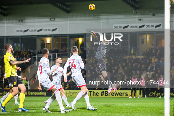 Goalkeeper Connal Trueman, 31, of Crawley Town makes the save during the Sky Bet League 1 match between Burton Albion and Crawley Town at th...