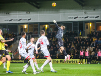 Goalkeeper Connal Trueman, 31, of Crawley Town makes the save during the Sky Bet League 1 match between Burton Albion and Crawley Town at th...