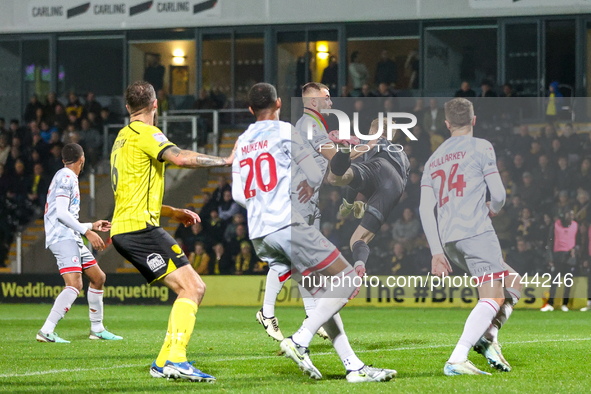 Goalkeeper Connal Trueman, 31, of Crawley Town makes the save during the Sky Bet League 1 match between Burton Albion and Crawley Town at th...