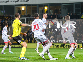 Goalkeeper Connal Trueman, 31, of Crawley Town makes the save during the Sky Bet League 1 match between Burton Albion and Crawley Town at th...