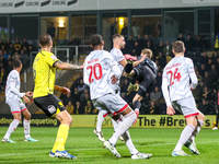 Goalkeeper Connal Trueman, 31, of Crawley Town makes the save during the Sky Bet League 1 match between Burton Albion and Crawley Town at th...