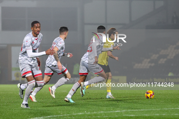 Number 8, Charlie Webster of Burton Albion, tries to find space for an attacking run during the Sky Bet League 1 match between Burton Albion...