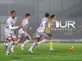 Number 8, Charlie Webster of Burton Albion, tries to find space for an attacking run during the Sky Bet League 1 match between Burton Albion...