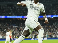 Vinicius Junior left winger of Real Madrid and Brazil celebrates after scoring his sides first goal during the UEFA Champions League 2024/25...