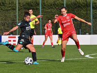 Antonietta Castiello of S.S. Lazio and Liucija Vaitukaityte of F.C. Como Women participate in the round of 16 of Coppa Italia Femminile betw...