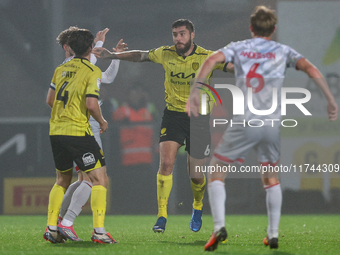 Ryan Sweeney of Burton Albion, number 6, is in defensive action during the Sky Bet League 1 match between Burton Albion and Crawley Town at...