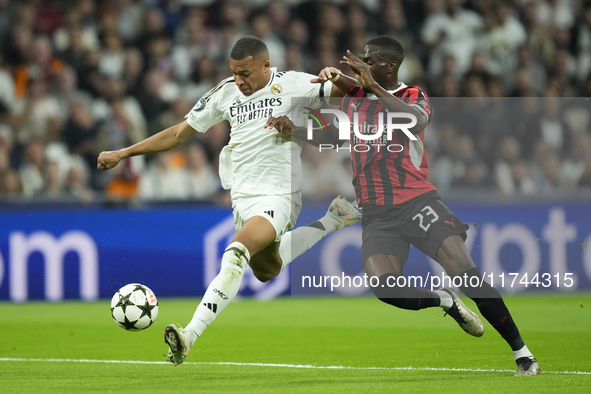 Kylian Mbappe centre-forward of Real Madrid and France and Fikayo Tomori centre-back of AC Milan and England during the UEFA Champions Leagu...