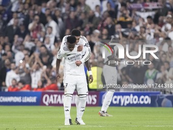 Vinicius Jr. of Real Madrid and Jude Bellingham of Real Madrid celebrate a goal during the UEFA Champions League 2024/25 match between Real...