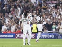 Vinicius Jr. of Real Madrid and Jude Bellingham of Real Madrid celebrate a goal during the UEFA Champions League 2024/25 match between Real...