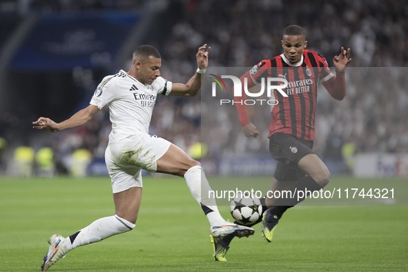 Kylian Mbappe of Real Madrid controls the ball during the UEFA Champions League 2024/25 match between Real Madrid and AC Milan at Santiago B...