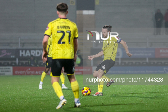 Elliot Watt of Burton Albion (right) is in action during the Sky Bet League 1 match between Burton Albion and Crawley Town at the Pirelli St...