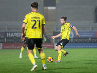 Elliot Watt of Burton Albion (right) is in action during the Sky Bet League 1 match between Burton Albion and Crawley Town at the Pirelli St...