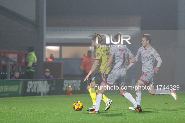 Number 16, Jack Cooper-Love of Burton Albion, is in action during the Sky Bet League 1 match between Burton Albion and Crawley Town at the P...