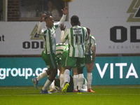 Richard Kone #24 of Wycombe Wanderers F.C. celebrates his goal with teammates during the Sky Bet League 1 match between Stockport County and...