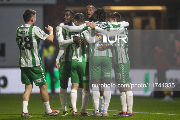 Richard Kone #24 of Wycombe Wanderers F.C. celebrates his goal with teammates during the Sky Bet League 1 match between Stockport County and...