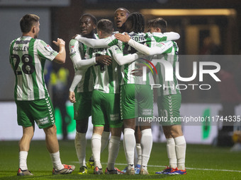 Richard Kone #24 of Wycombe Wanderers F.C. celebrates his goal with teammates during the Sky Bet League 1 match between Stockport County and...