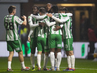 Richard Kone #24 of Wycombe Wanderers F.C. celebrates his goal with teammates during the Sky Bet League 1 match between Stockport County and...