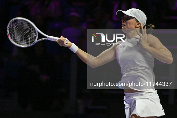 RIYADH, SAUDI ARABIA - NOVEMBER 05: Iga Swiatek of Poland during her match against Coco Gauff of USA, on day 4 of the 2024 WTA Finals, part...