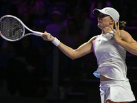 RIYADH, SAUDI ARABIA - NOVEMBER 05: Iga Swiatek of Poland during her match against Coco Gauff of USA, on day 4 of the 2024 WTA Finals, part...