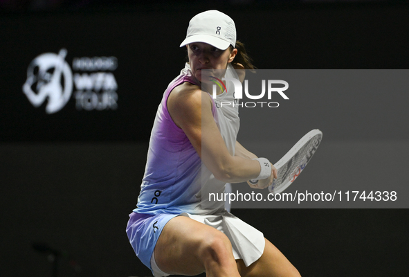 RIYADH, SAUDI ARABIA - NOVEMBER 05: Iga Swiatek of Poland during her match against Coco Gauff of USA, on day 4 of the 2024 WTA Finals, part...