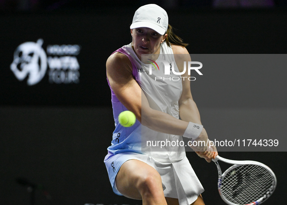 RIYADH, SAUDI ARABIA - NOVEMBER 05: Iga Swiatek of Poland during her match against Coco Gauff of USA, on day 4 of the 2024 WTA Finals, part...