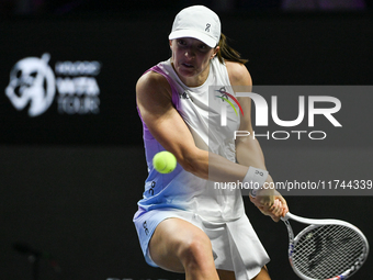 RIYADH, SAUDI ARABIA - NOVEMBER 05: Iga Swiatek of Poland during her match against Coco Gauff of USA, on day 4 of the 2024 WTA Finals, part...