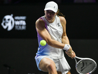 RIYADH, SAUDI ARABIA - NOVEMBER 05: Iga Swiatek of Poland during her match against Coco Gauff of USA, on day 4 of the 2024 WTA Finals, part...