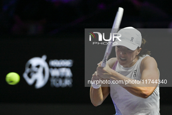 RIYADH, SAUDI ARABIA - NOVEMBER 05: Iga Swiatek of Poland during her match against Coco Gauff of USA, on day 4 of the 2024 WTA Finals, part...