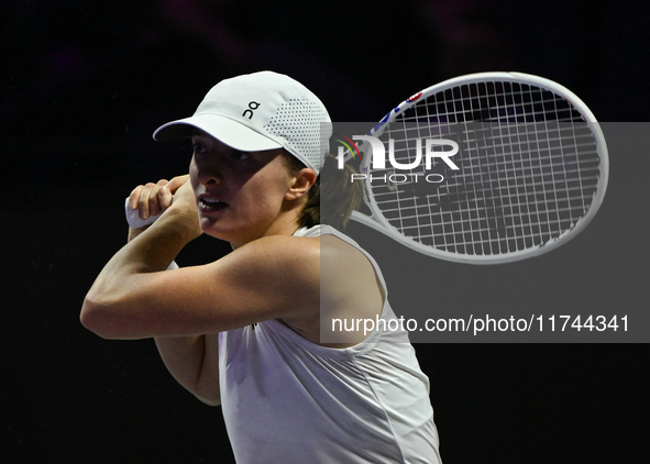 RIYADH, SAUDI ARABIA - NOVEMBER 05: Iga Swiatek of Poland during her match against Coco Gauff of USA, on day 4 of the 2024 WTA Finals, part...