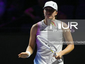 RIYADH, SAUDI ARABIA - NOVEMBER 05: Iga Swiatek of Poland during her match against Coco Gauff of USA, on day 4 of the 2024 WTA Finals, part...