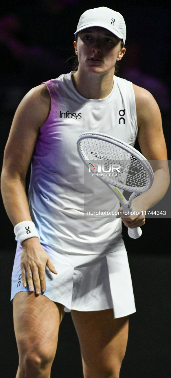 RIYADH, SAUDI ARABIA - NOVEMBER 05: Iga Swiatek of Poland during her match against Coco Gauff of USA, on day 4 of the 2024 WTA Finals, part...