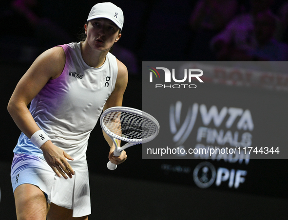 RIYADH, SAUDI ARABIA - NOVEMBER 05: Iga Swiatek of Poland during her match against Coco Gauff of USA, on day 4 of the 2024 WTA Finals, part...